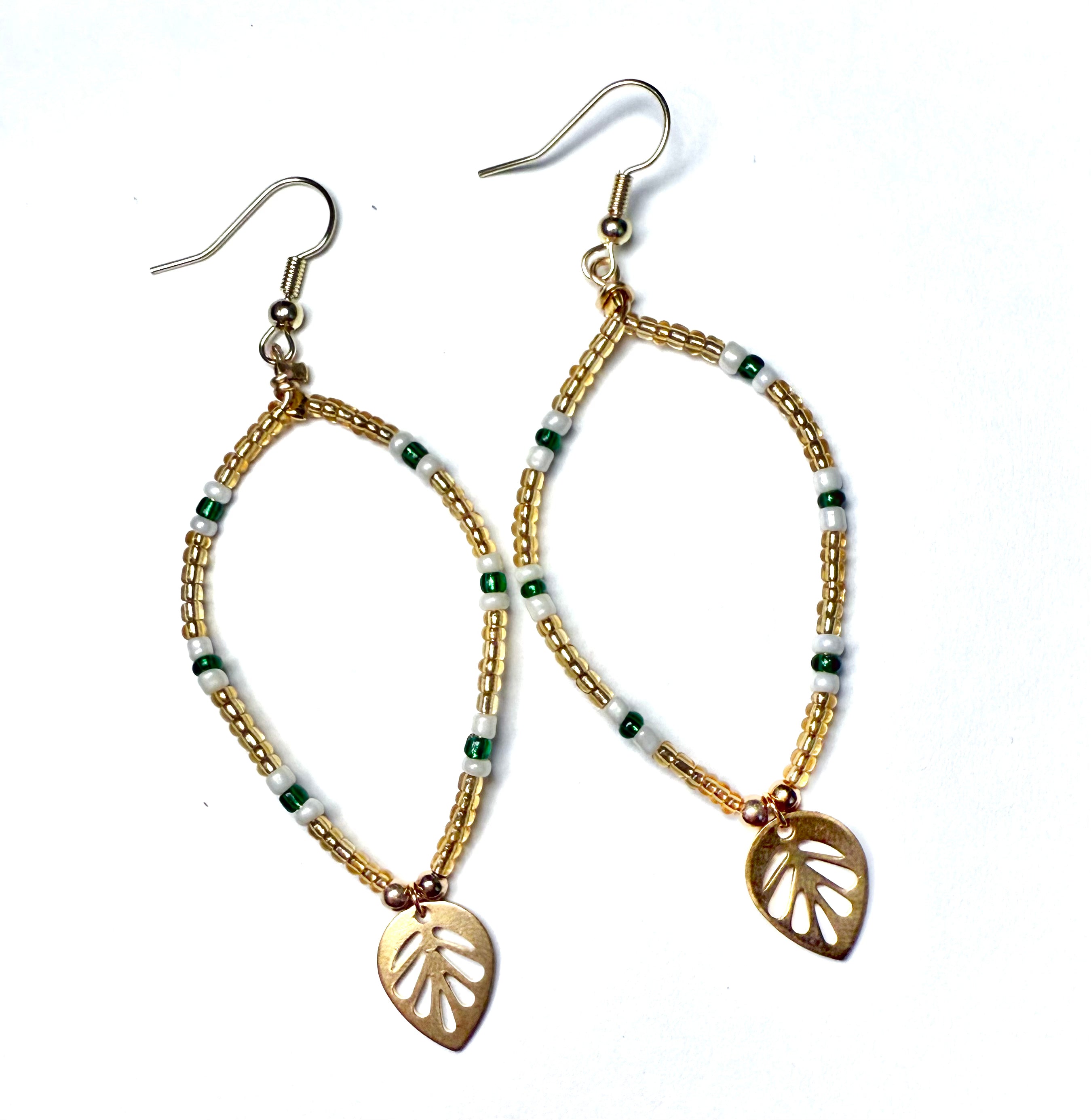 Gilded and green leaf beaded earrings
